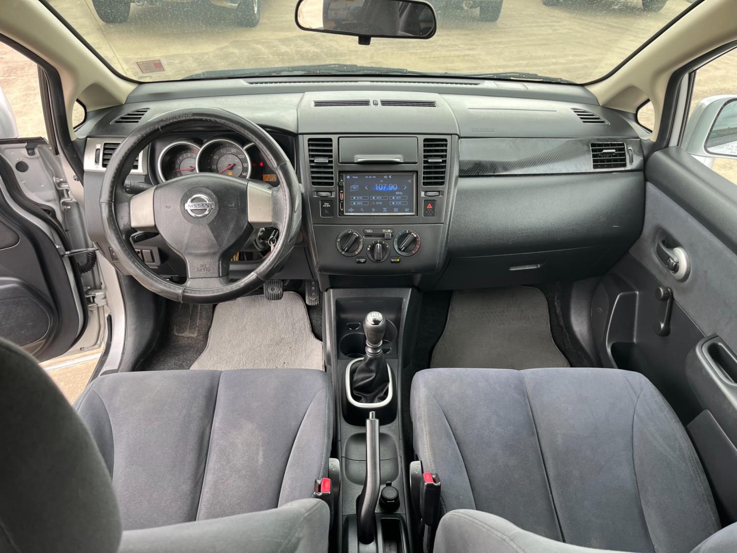 2009 SILVER /black Nissan Versa 1.8 S Hatchback (3N1BC13E09L) with an 1.8L L4 DOHC 16V engine, Manual transmission, located at 14700 Tomball Parkway 249, Houston, TX, 77086, (281) 444-2200, 29.928619, -95.504074 - Photo#10